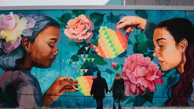 A colourful mural on the side of the St. Thomas Public Library