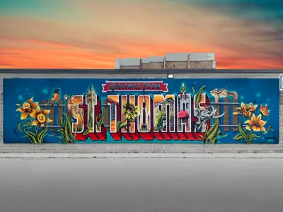 A colourful mural that reads, "Greetings from St. Thomas"